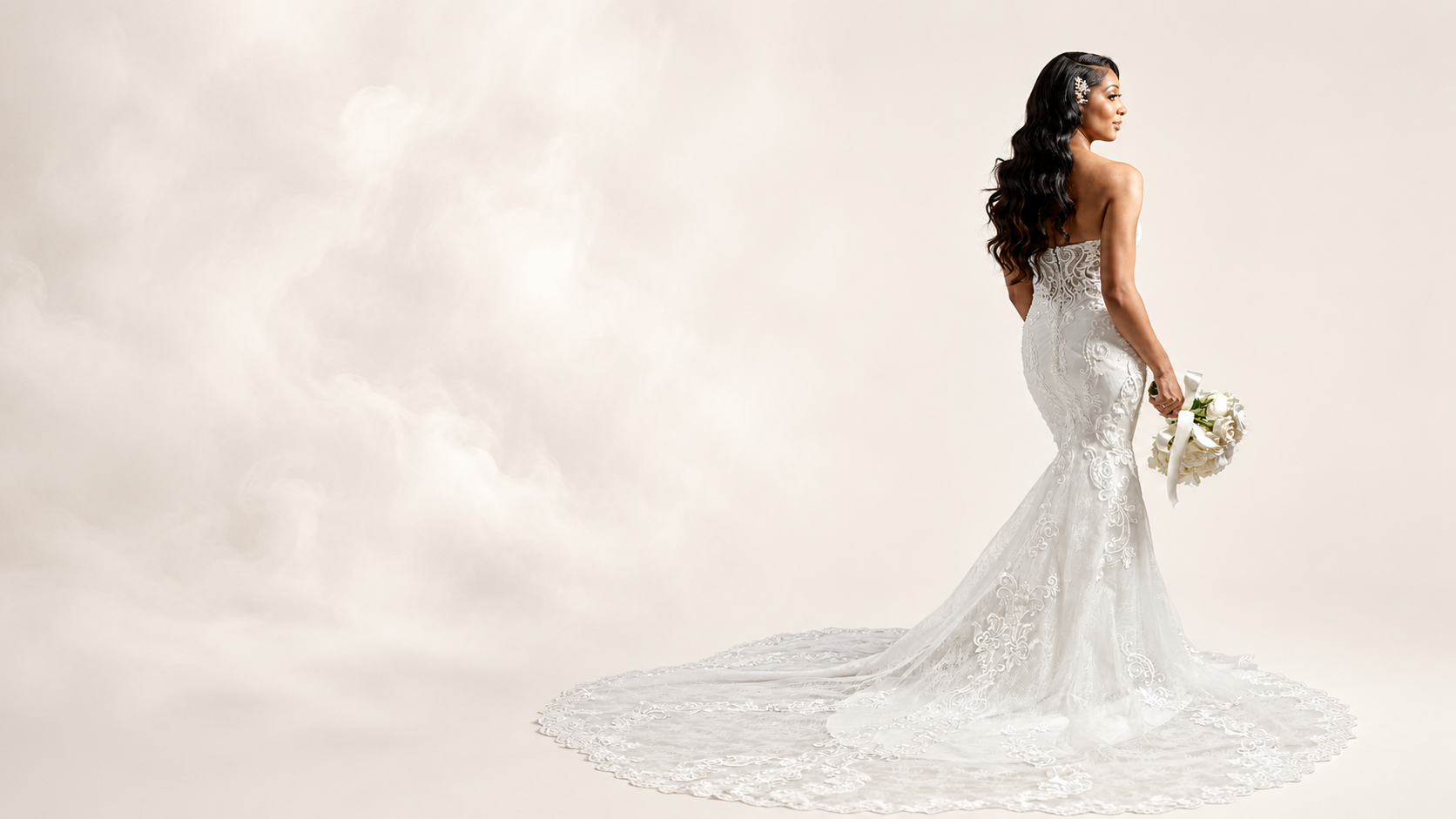 Bridal client in lace gown with flowing waves